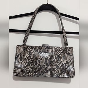 Guess hand held bag in snake skin print